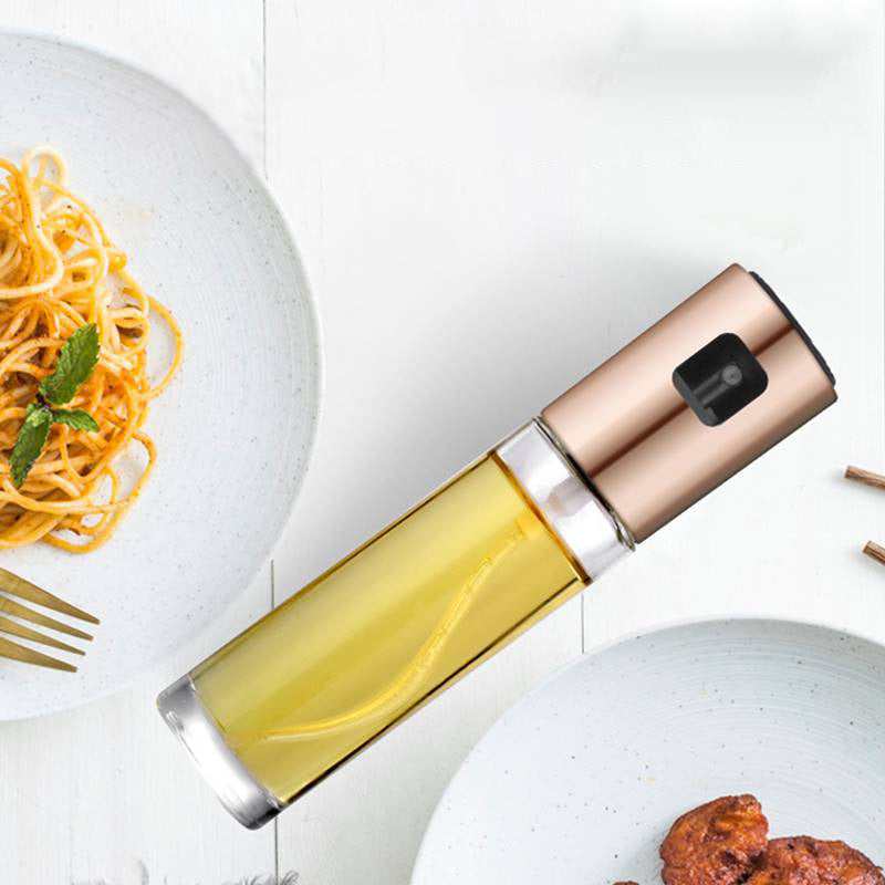 Glass oil sprayer with silver pump top