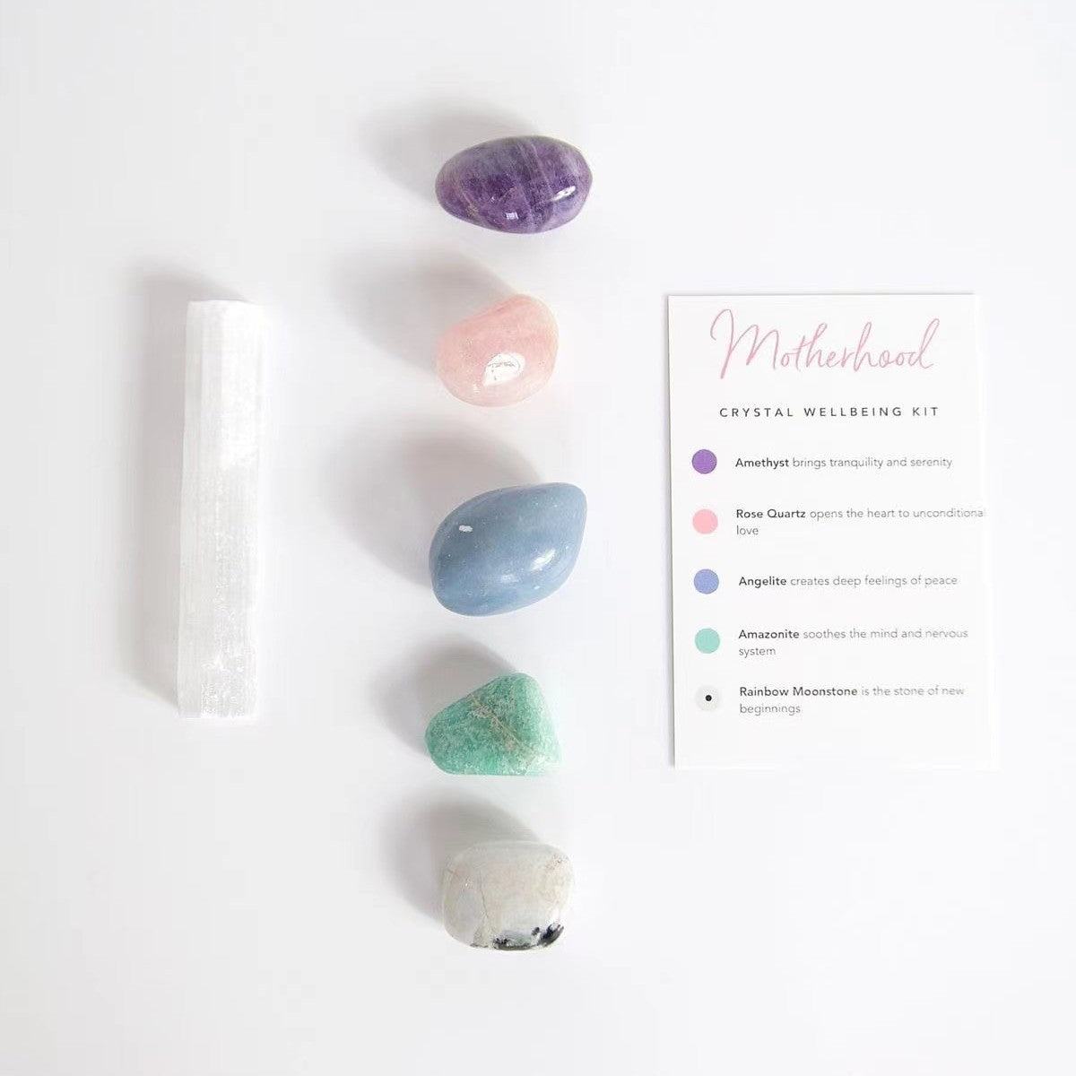 Crystal kit laid out: amethyst, angelite, howlite, amazonite, hematite