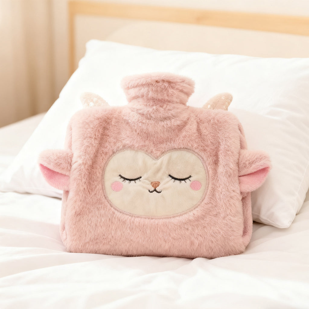 Yutanpo plush hot water bottle with a pink lamb cover on a bed
