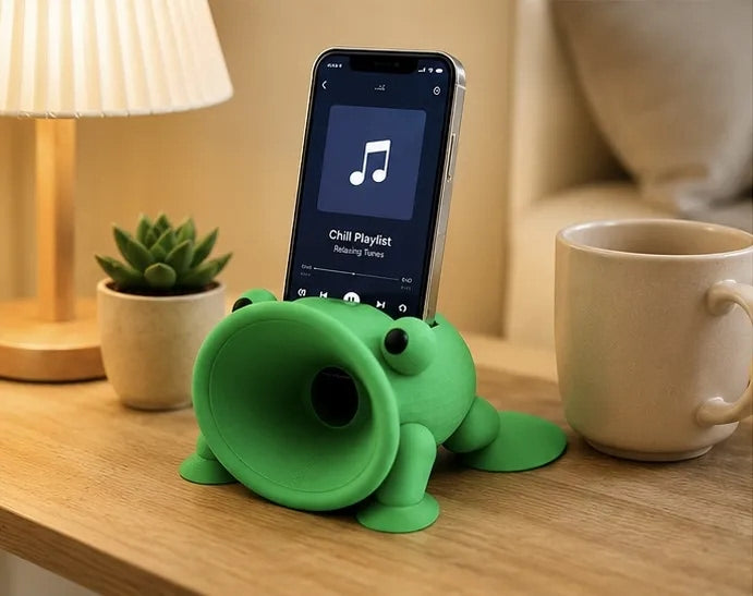 Frog phone stand on a desk