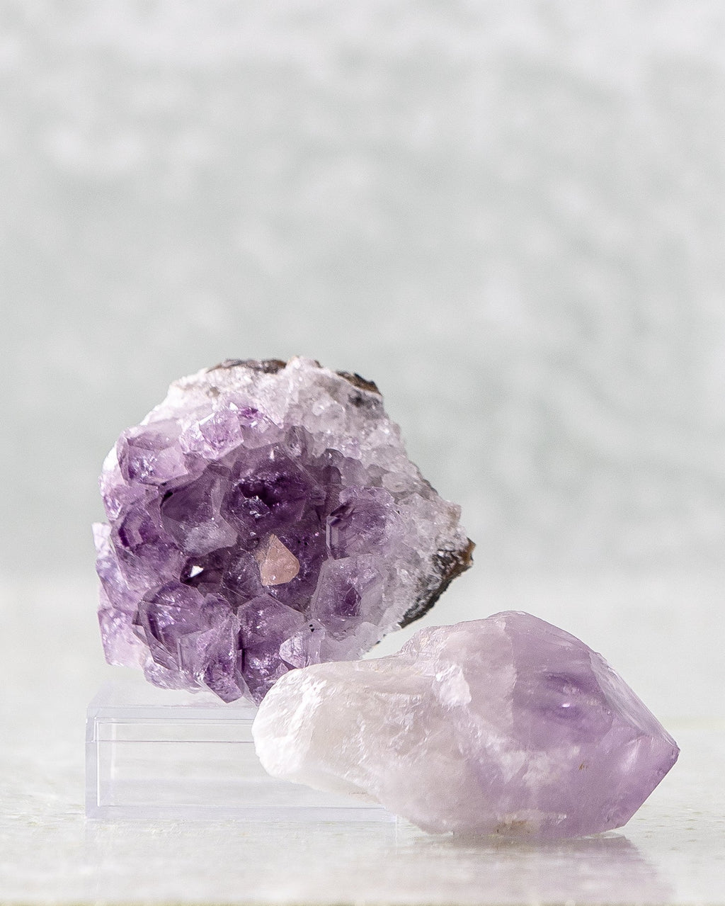 Amethyst point in a muslin bag with card