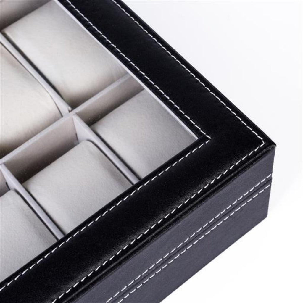 Close-up of the slots and cushions inside the watch box