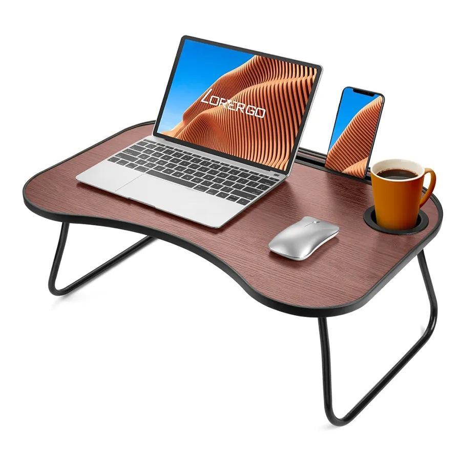 Zataku folding bed tray desk in walnut with a laptop, phone and mug