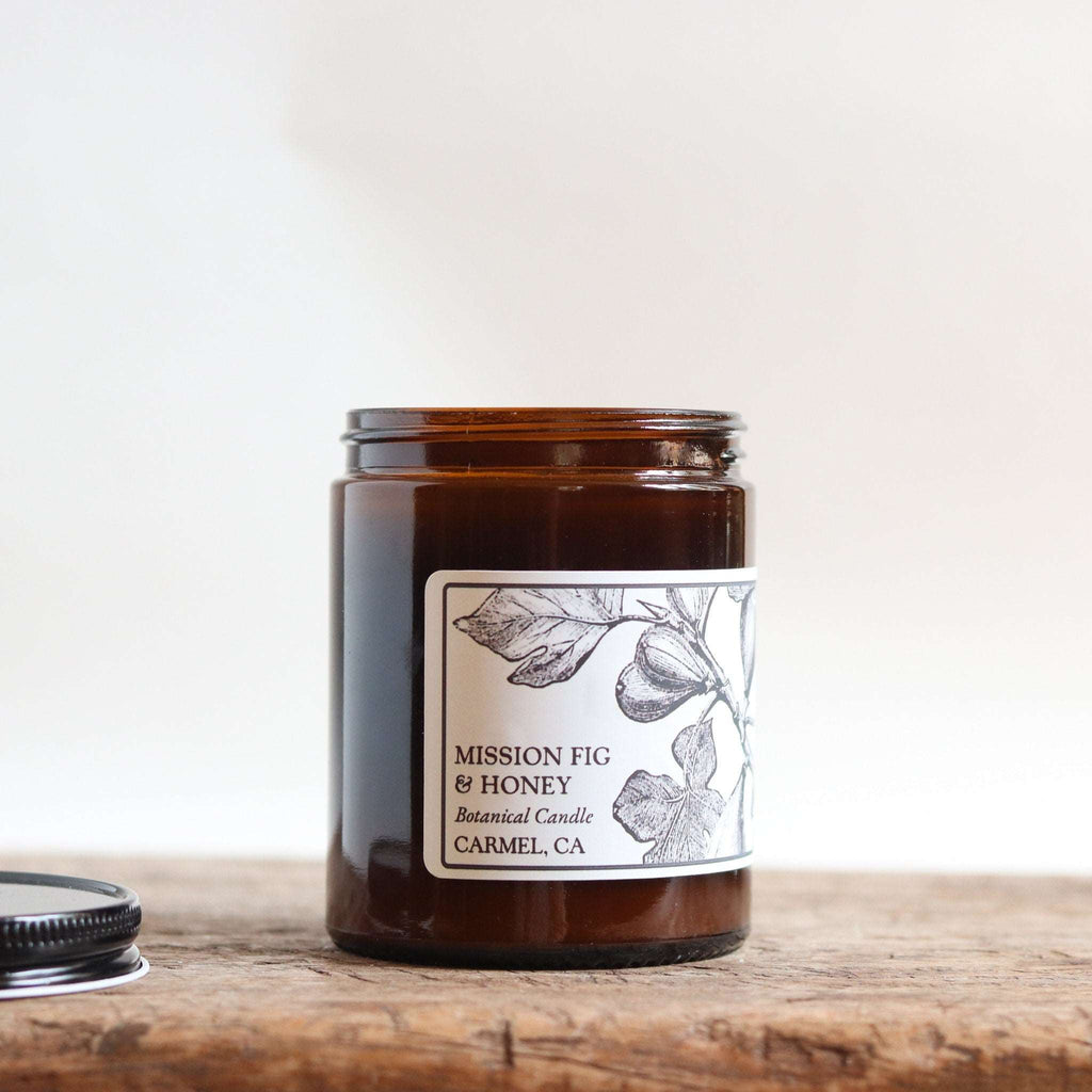 Nustad Family Ranch botanical soy candle in an amber jar