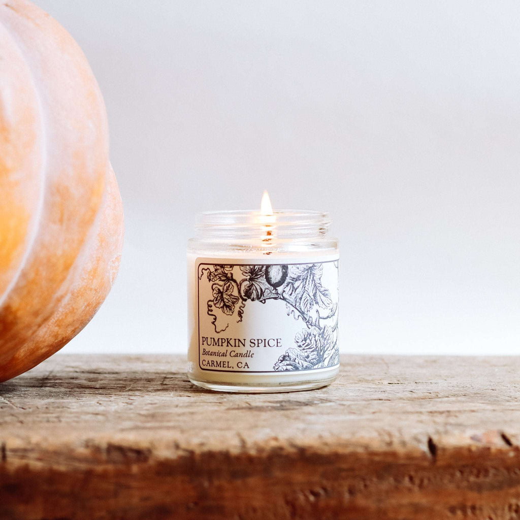 Botanical soy candle lit
